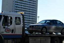 Portrait happy, smiling woman sitting in the car looking out windows.jpg