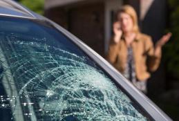 Portrait happy, smiling woman sitting in the car looking out windows.jpg