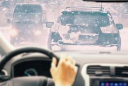 Portrait happy, smiling woman sitting in the car looking out windows.jpg