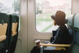 Portrait happy, smiling woman sitting in the car looking out windows.jpg