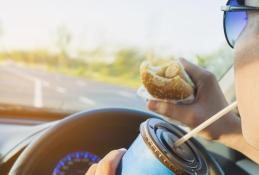 Portrait happy, smiling woman sitting in the car looking out windows.jpg