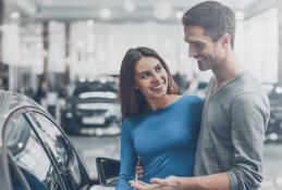 Portrait happy, smiling woman sitting in the car looking out windows.jpg