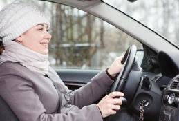 Portrait happy, smiling woman sitting in the car looking out windows.jpg