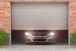 Portrait happy, smiling woman sitting in the car looking out windows.jpg