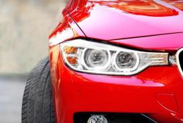 Portrait happy, smiling woman sitting in the car looking out windows.jpg
