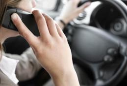 Portrait happy, smiling woman sitting in the car looking out windows.jpg