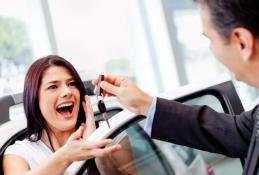 Portrait happy, smiling woman sitting in the car looking out windows.jpg