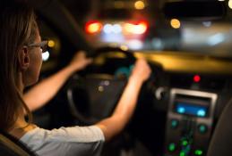 Portrait happy, smiling woman sitting in the car looking out windows.jpg